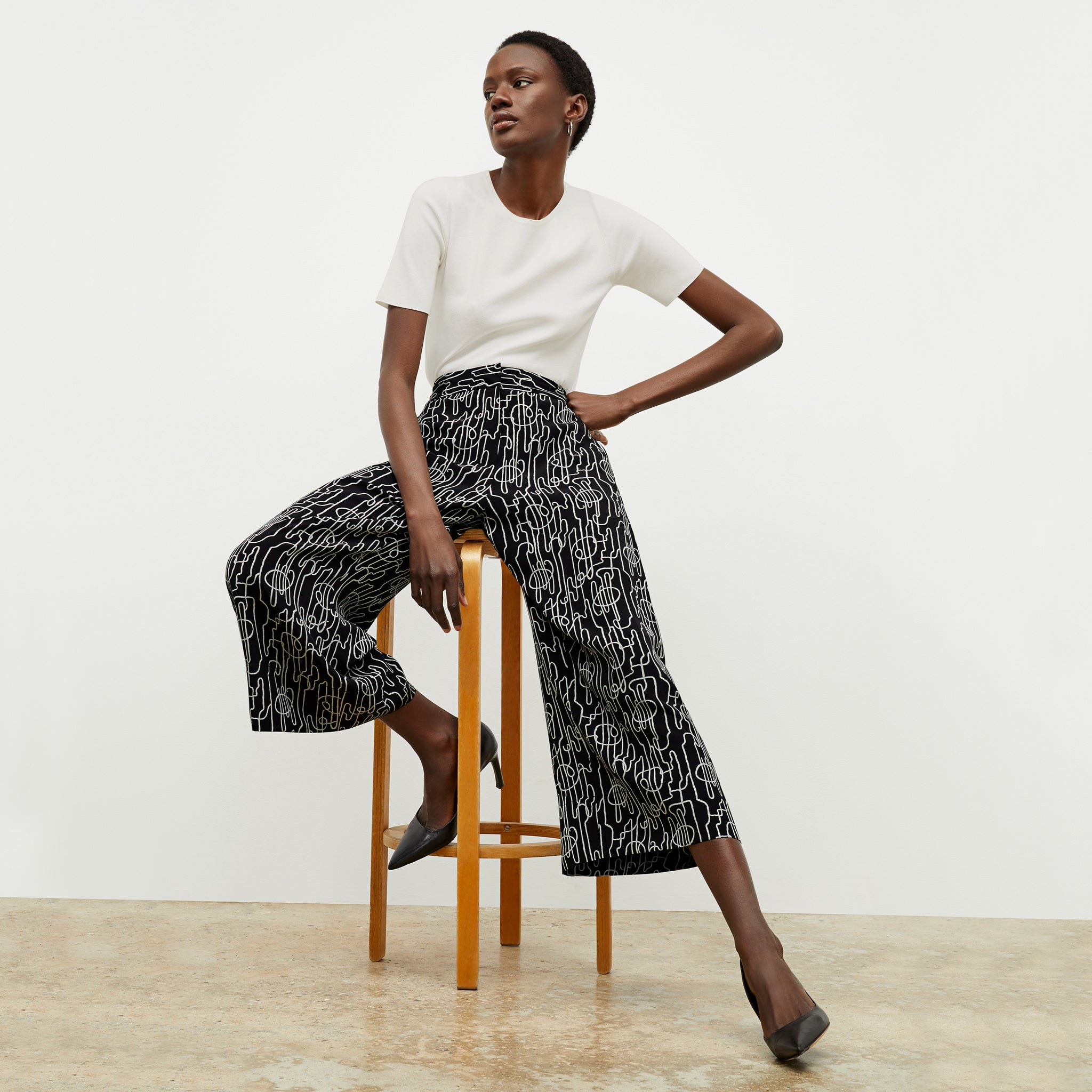 front image of a woman wearing the zhou culotte in symphony print
