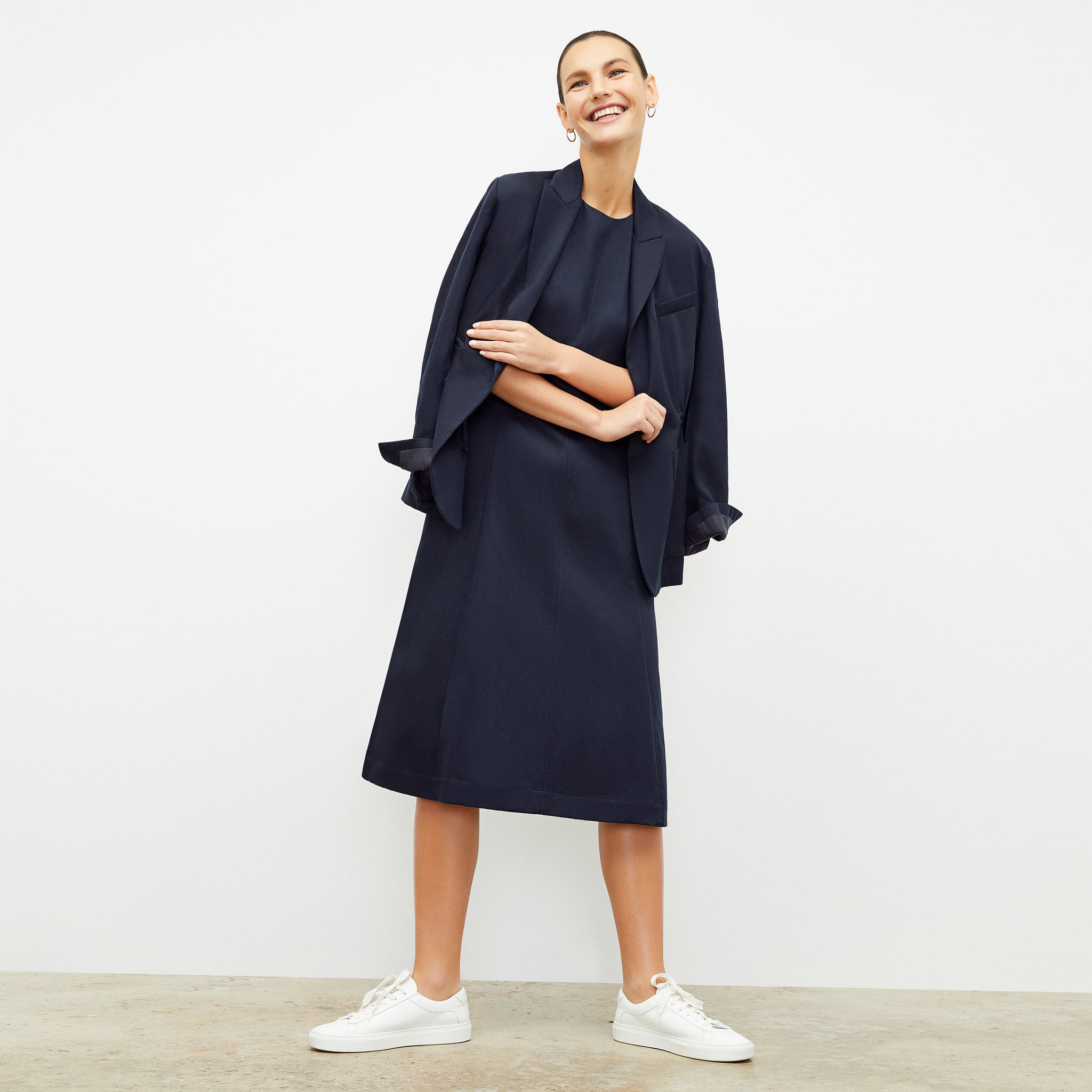 Front image of a woman wearing the Estela Dress in Night