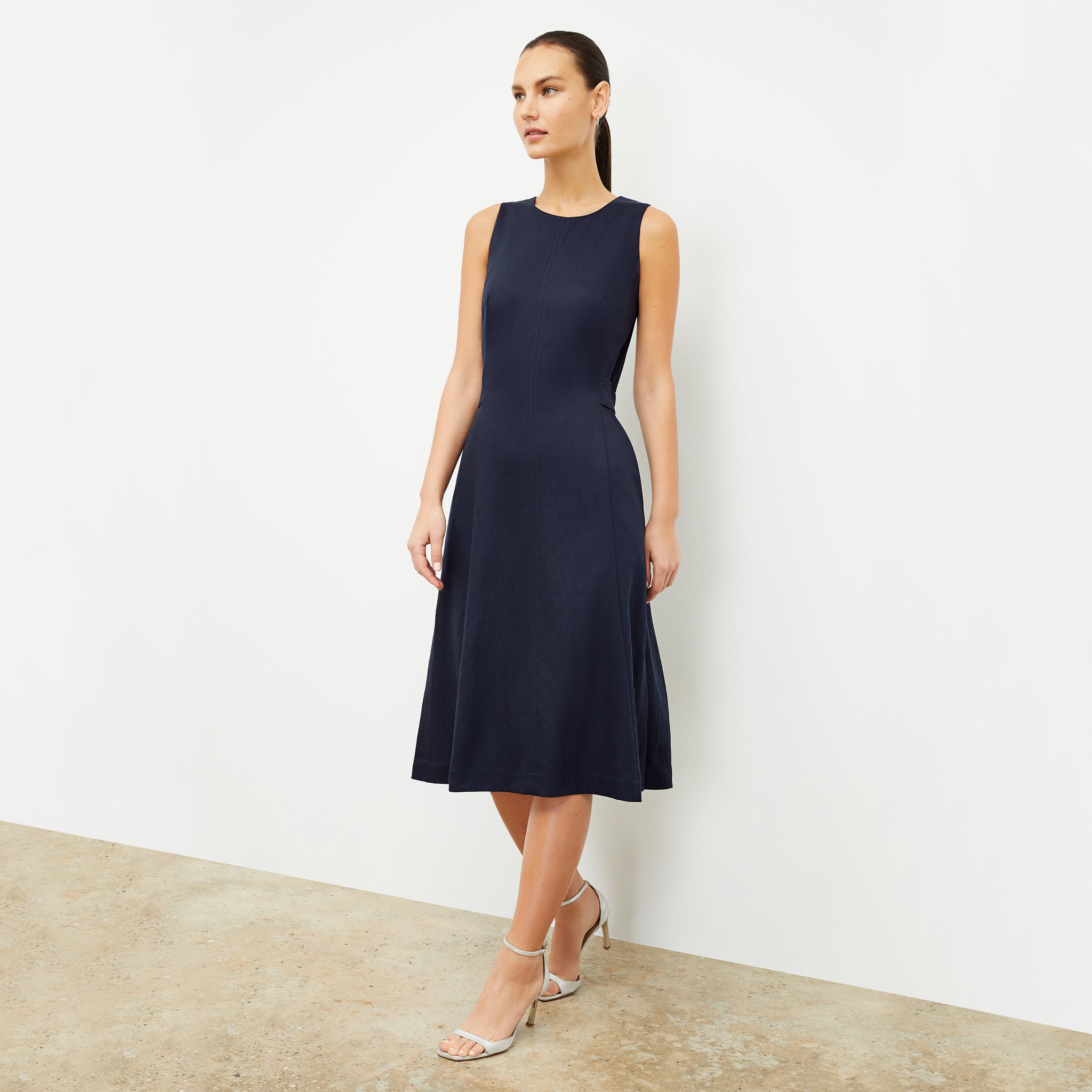 Front image of a woman wearing the Estela Dress in Night 