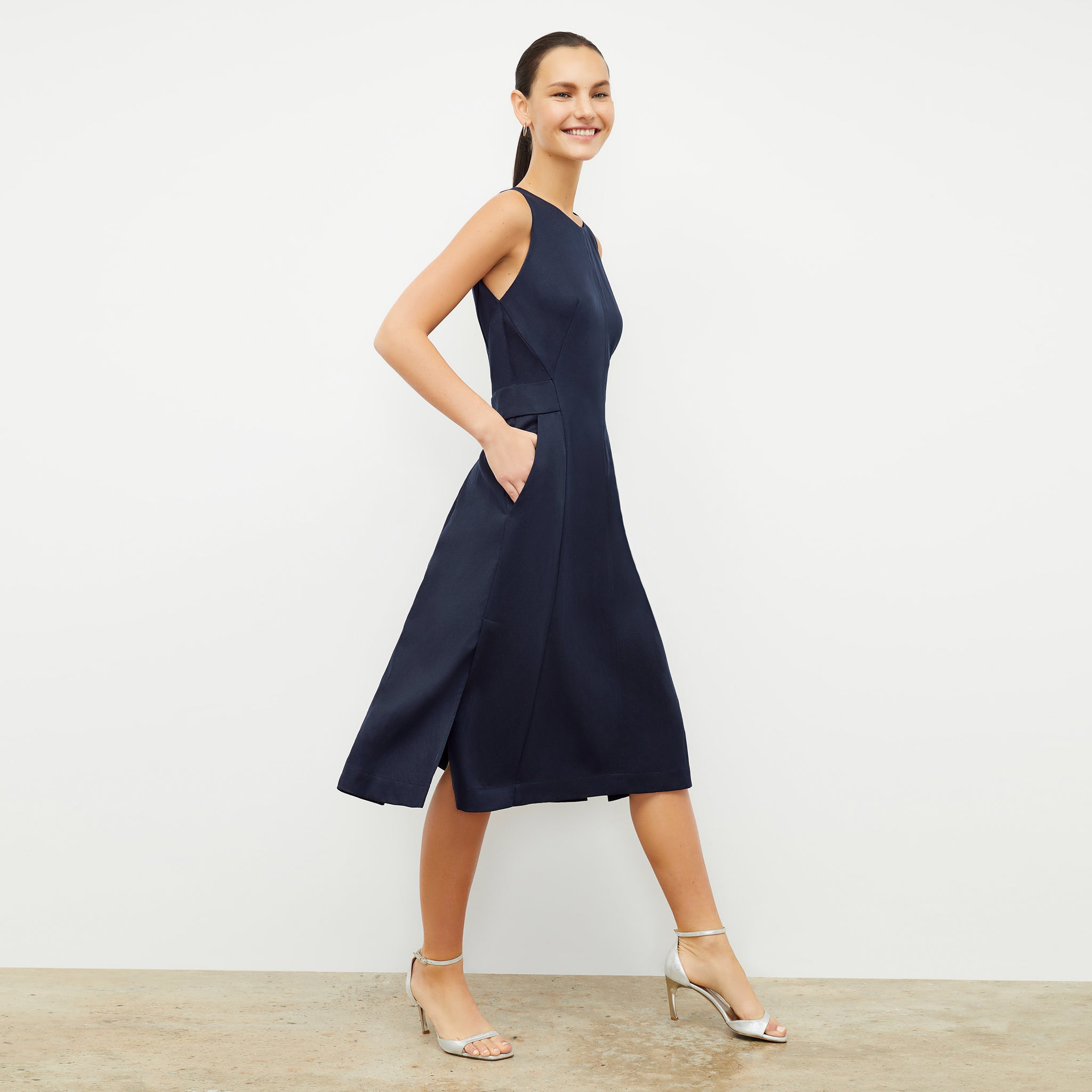 Side image of a woman wearing the Estela Dress in Night