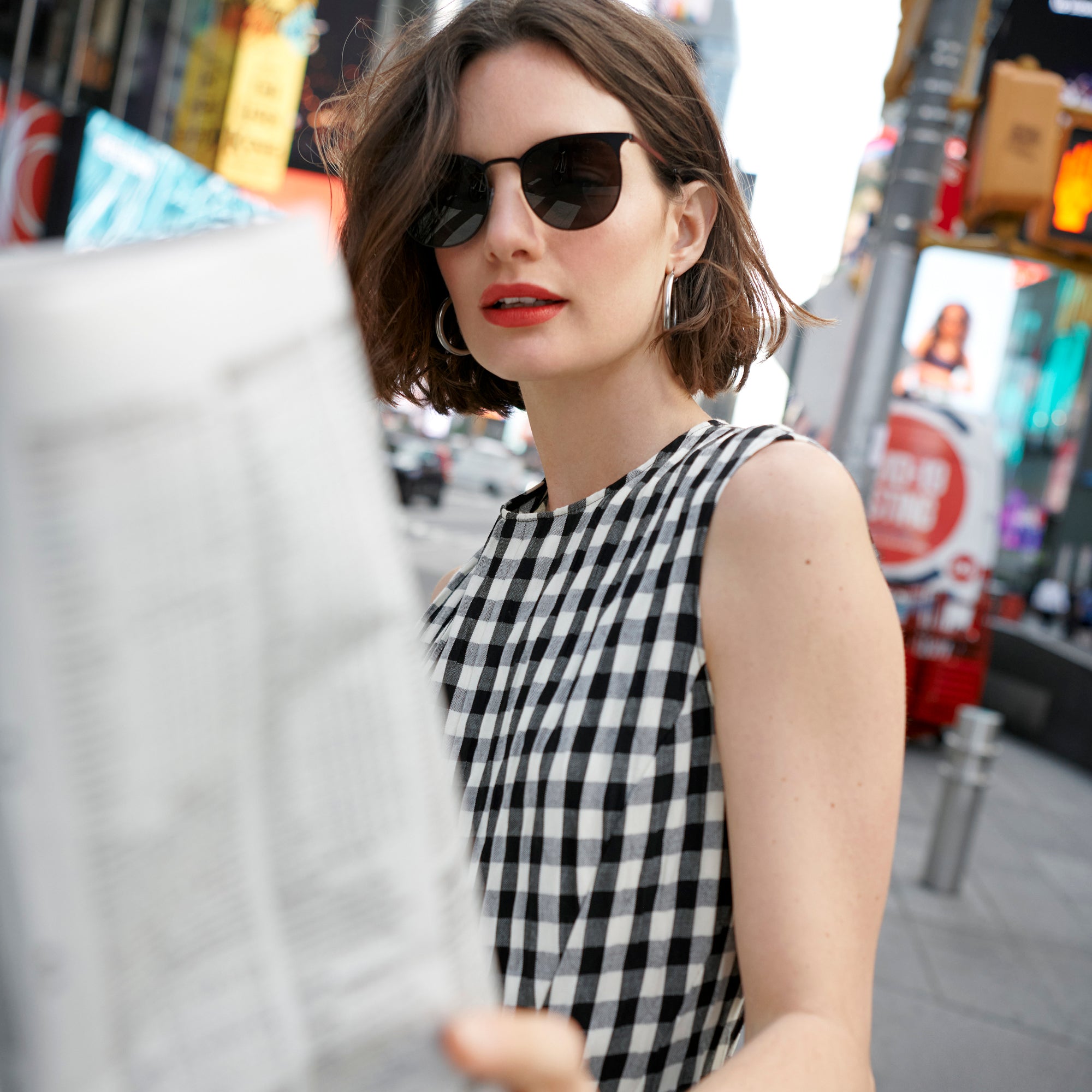 image of a woman wearing the nyla dress in black and white
