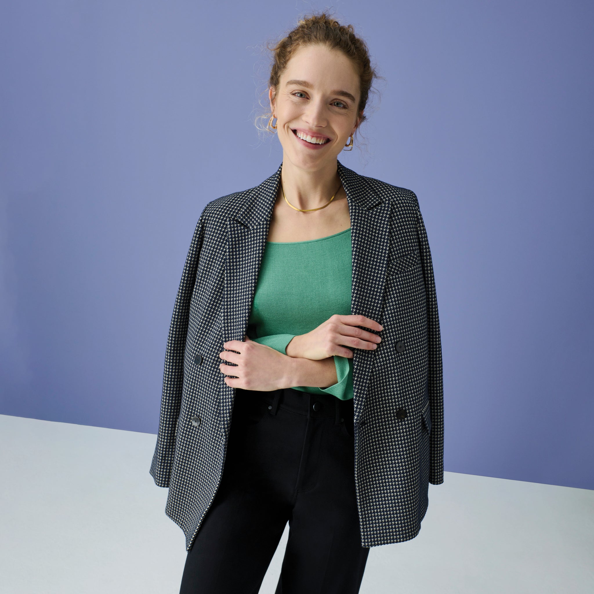 Front image of a woman with the O'Hara Blazer in Houndstooth over her shoulders