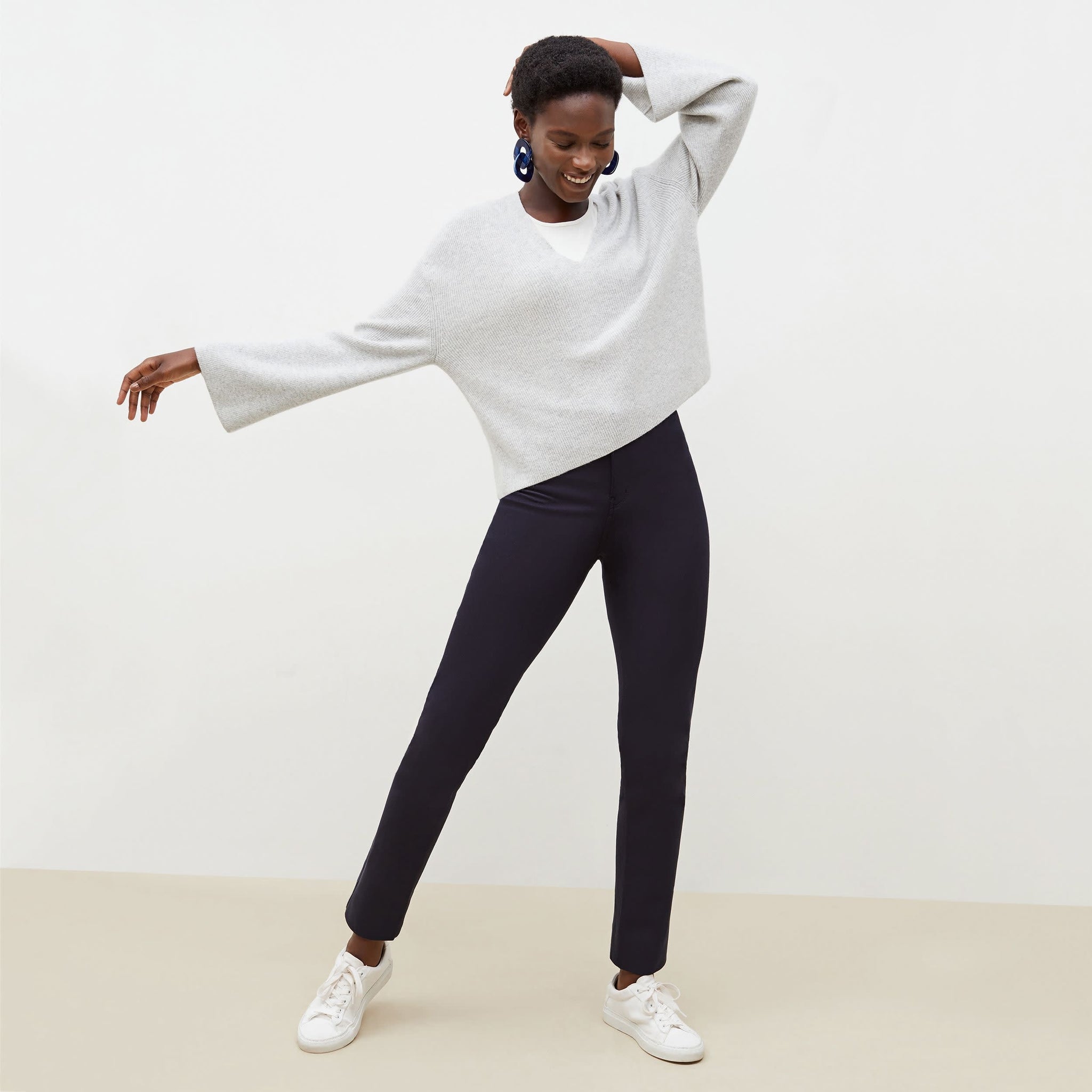 Front image of a woman standing wearing the Hockley pant in ink 
