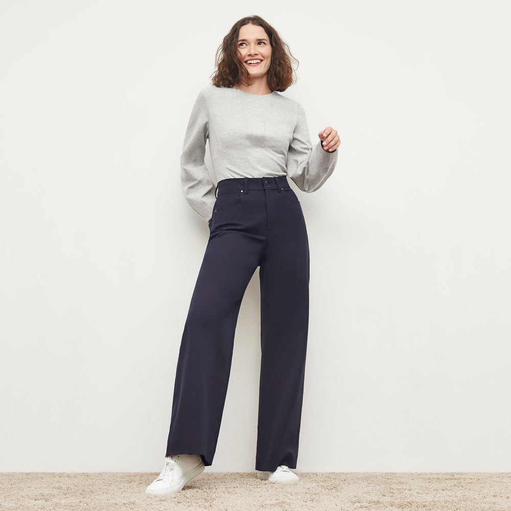 Front image of a woman standing wearing the Rashida Top in Gray Melange